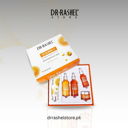Dr. Rashel Vitamin C skincare set with packaging on a light gray background